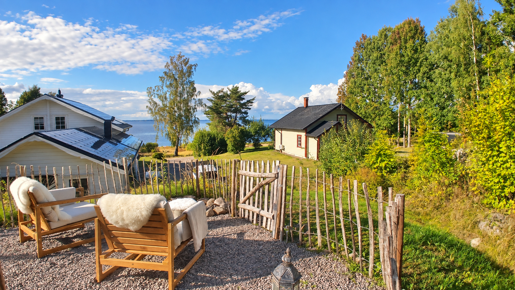 Relaxed terrace seating with Lake Skagern beyond