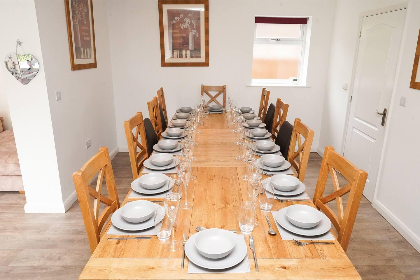 Bright dining table with seating for 20 guests